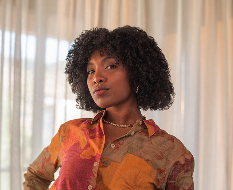 Woman with a hopeful facial expression looking into the camera
